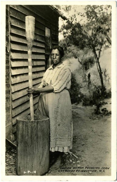 1940 woman pounding corn